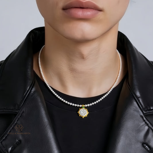 Close-up of a person wearing a Roman coin pearl choker necklace with a gold pendant and leather jacket
