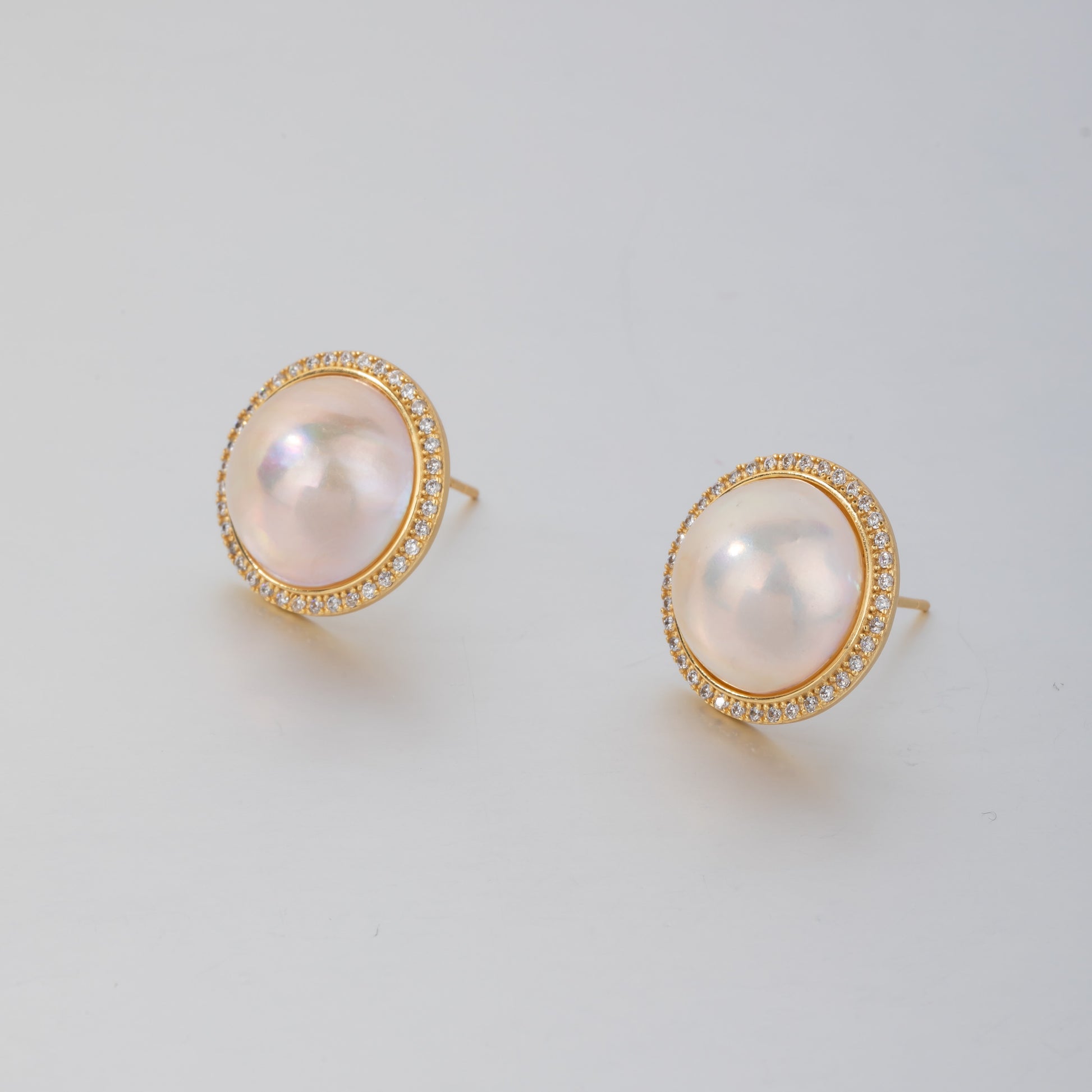 STELLA MARGARITA mabe pearl diamond rim earrings with gold setting and sparkling diamond border