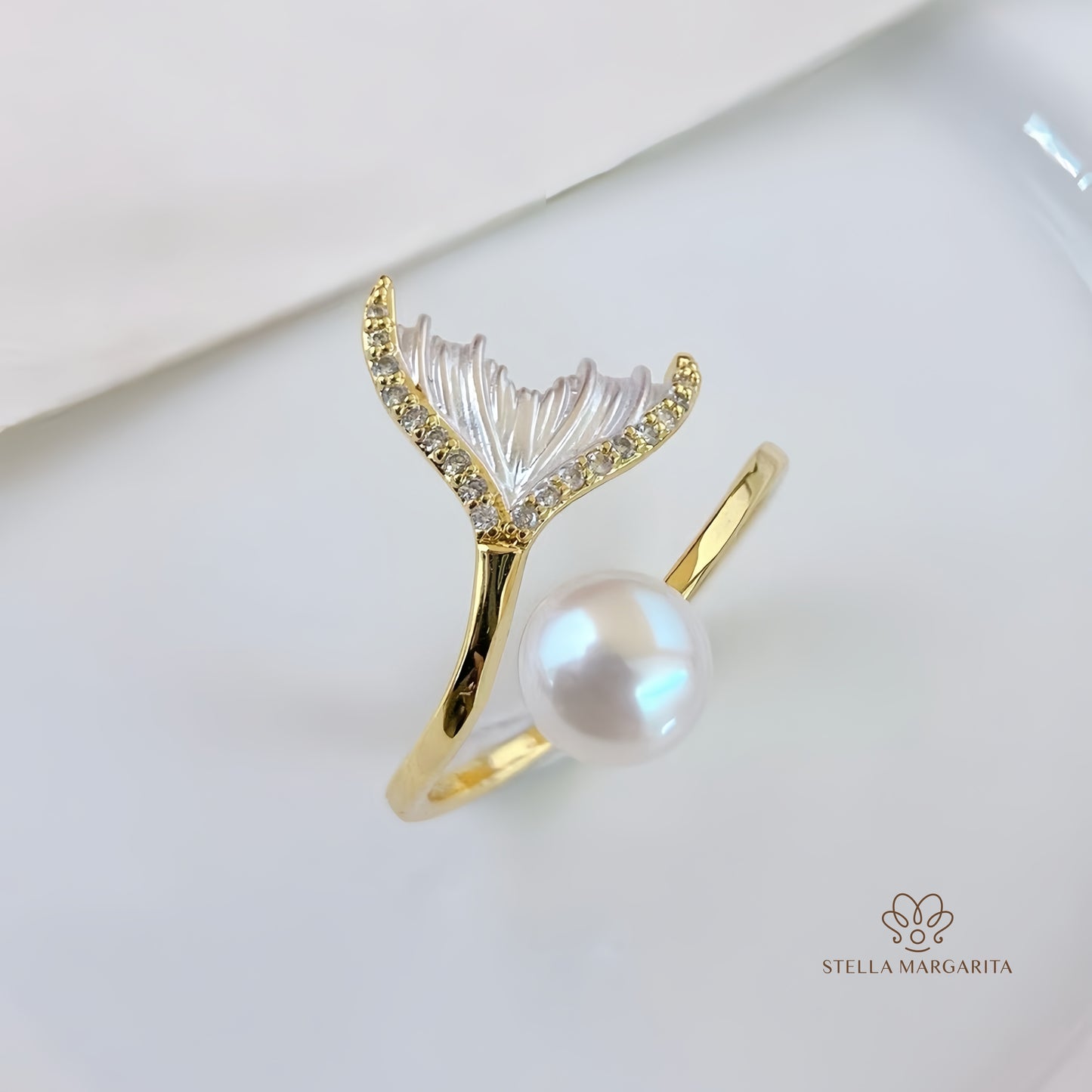 Gold adjustable pearl ring for brides with a white pearl and decorative diamond accents by Stella Margarita