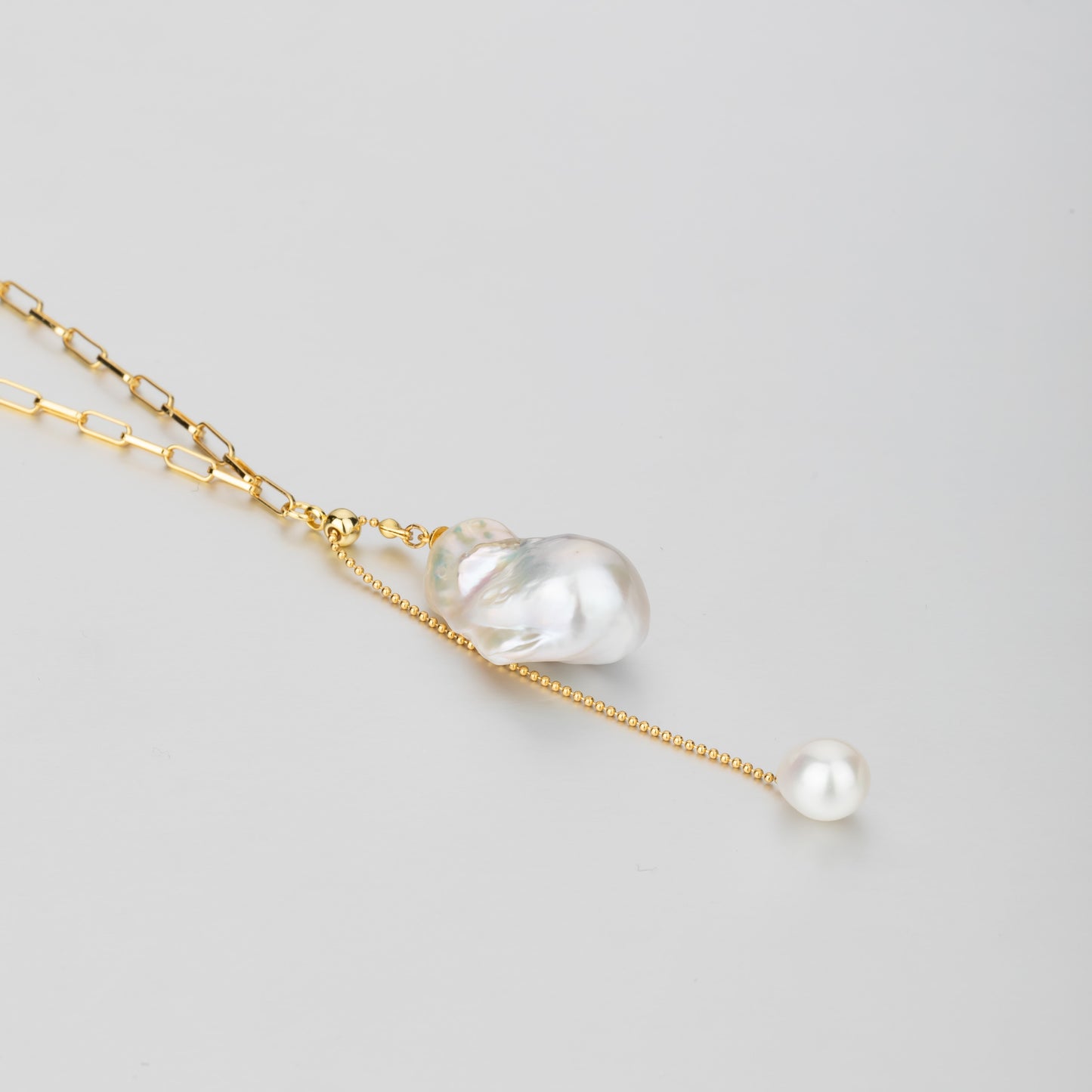 STELLA MARGARITA handcrafted pearl pendant necklace with gold chain and elegant pearl accents