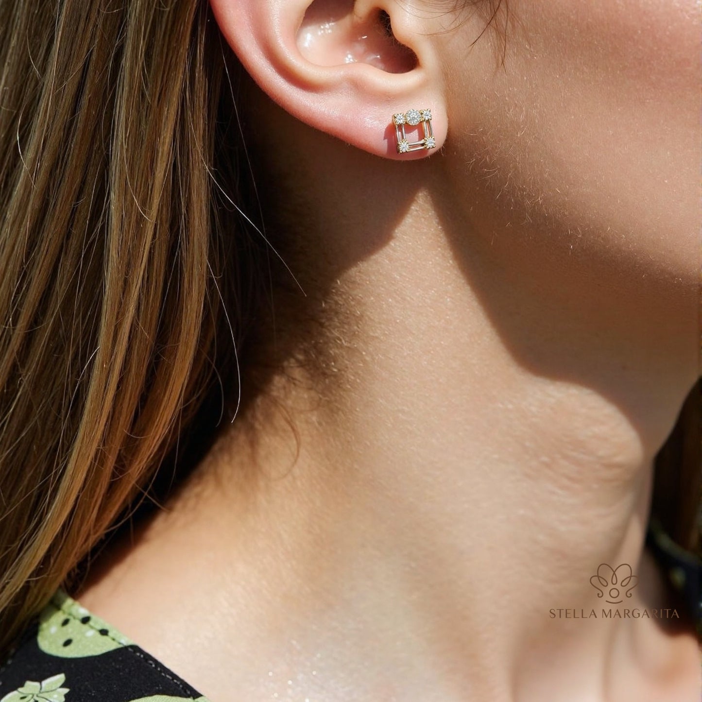STELLA MARGARITA square pearl stud earrings worn on ear with gold and diamond details