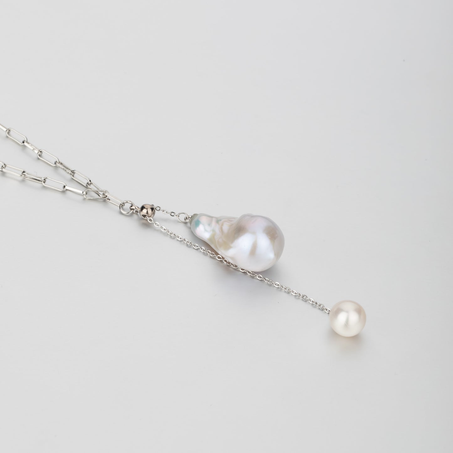 STELLA MARGARITA handcrafted sterling silver pearl necklace with unique baroque and round pearl pendants