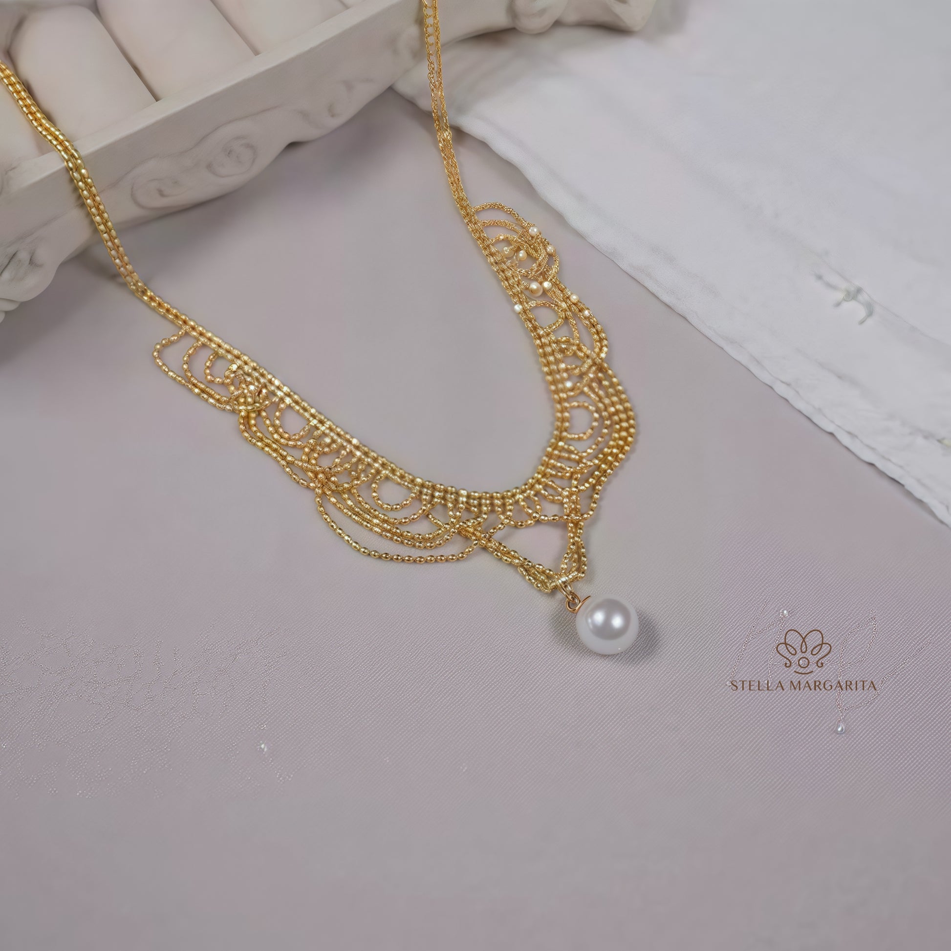 STELLA MARGARITA gold lace pearl choker necklace with intricate design and single hanging pearl