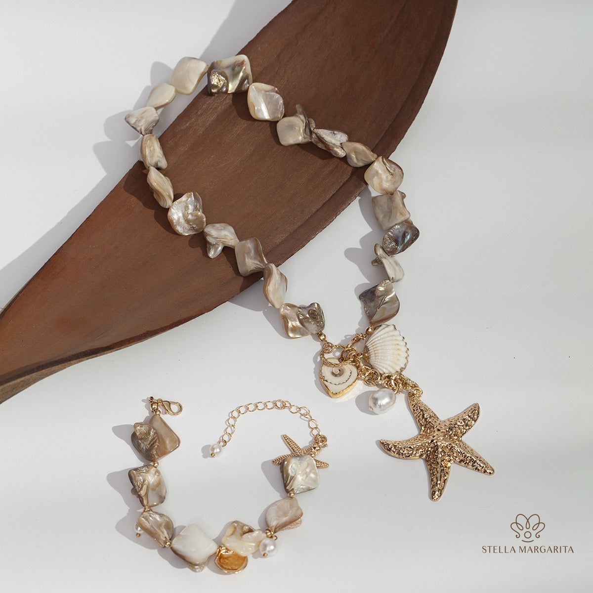 Stella Margarita mother of pearl starfish necklace with matching bracelet featuring shell and pearl charms