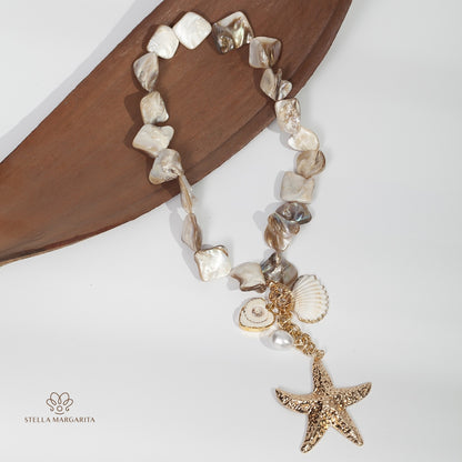 STELLA MARGARITA mother of pearl starfish necklace with gold starfish charm and shell accents