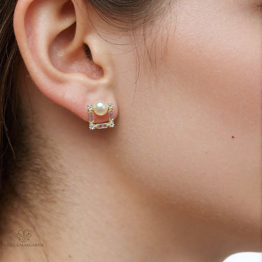 STELLA MARGARITA square pearl stud earrings with gold and diamond accents worn on ear