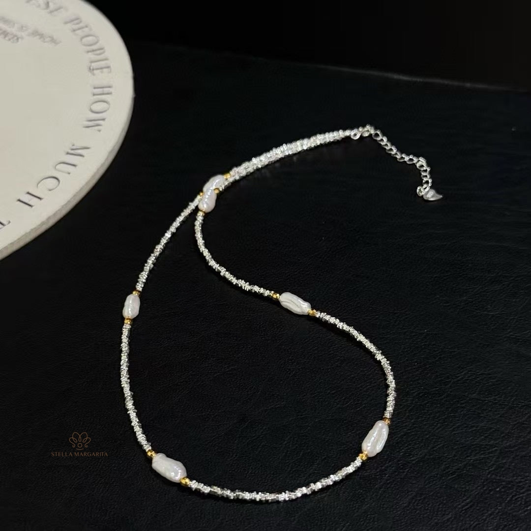 STELLA MARGARITA sterling silver baroque pearl choker with irregular pearls and silver chain on black background