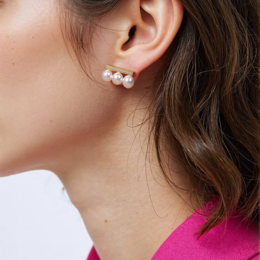 STELLA MARGARITA earrings featuring a gold bar and three pearls, a unique pearl jewelry for women